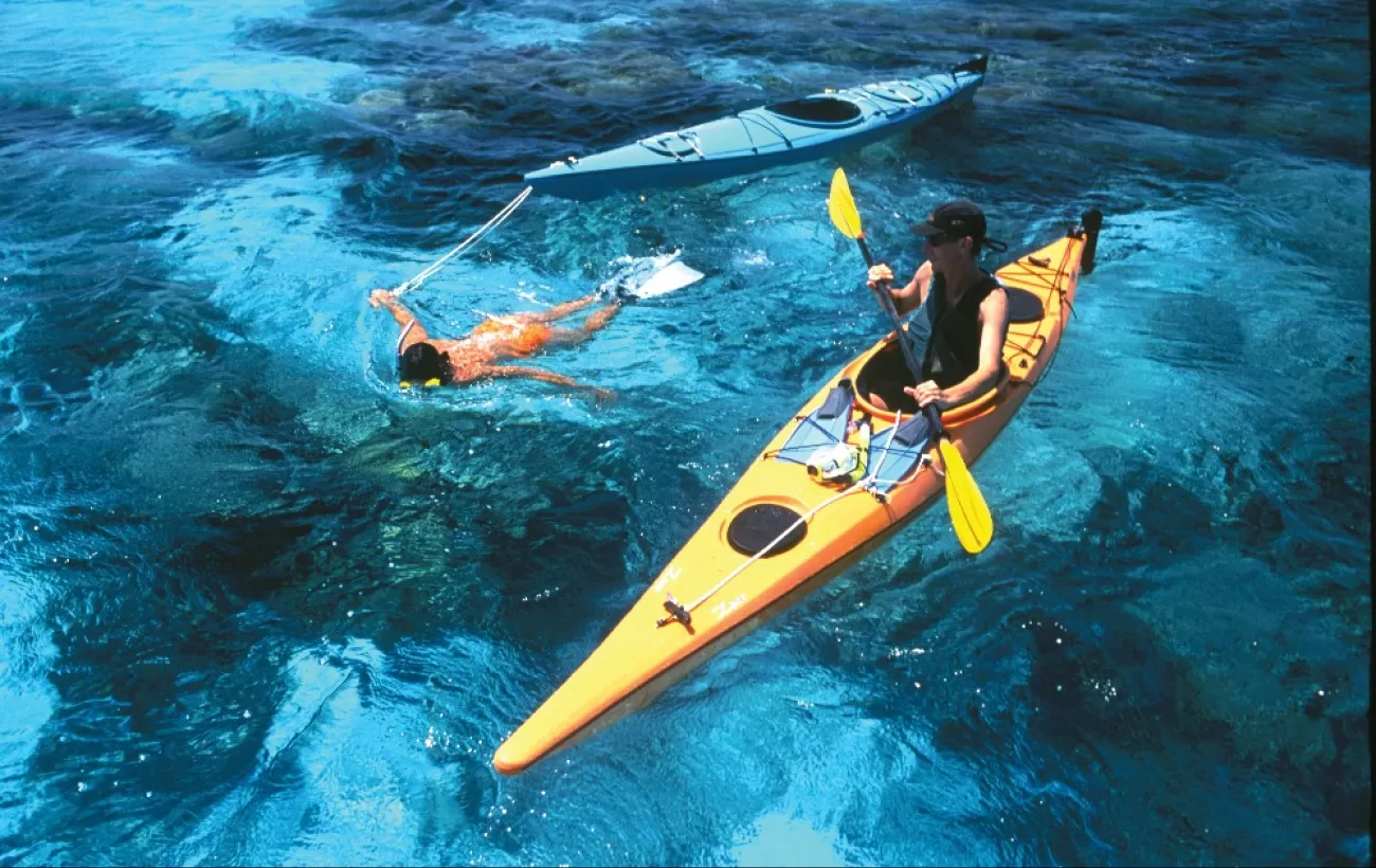 Kayak and snorkel in clear blue waters