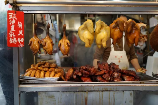 Street vendor food including roasted duck