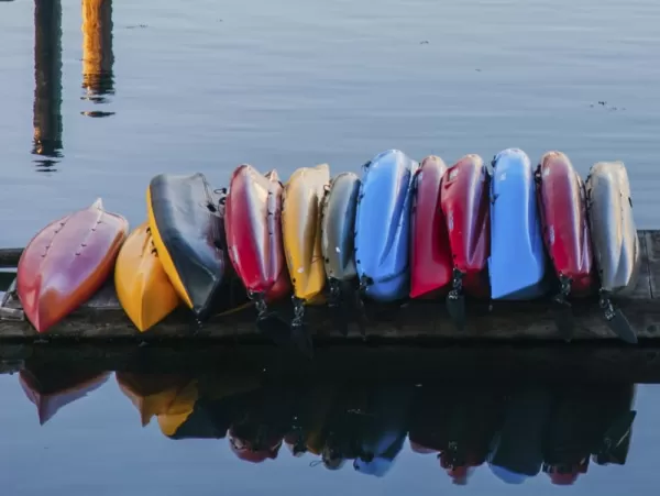 Colorful kayaks line the docks of coastal Washington
