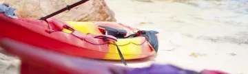 Colorful kayaks on the beach