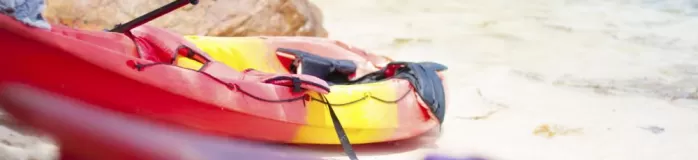 Colorful kayaks on the beach