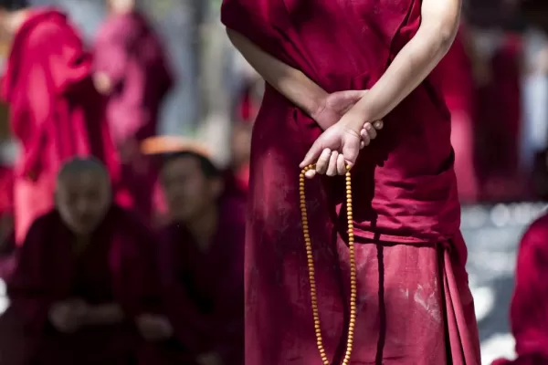 Monk with prayer beads
