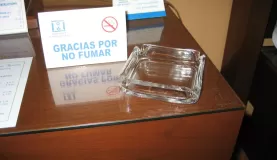 No smoking sign next to an ash tray in our hotel room