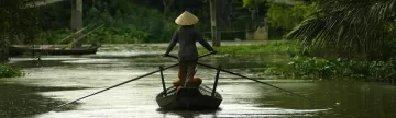 Woman on a boat in Vietnam