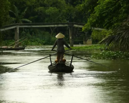 Woman on a boat in Vietnam