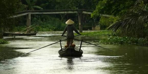 Woman on a boat in Vietnam