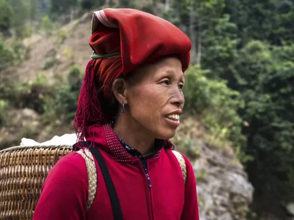 Red Dao woman in traditional headdress, Sapa, Lao Cai