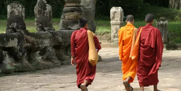 Monks walking near Angkor Thom