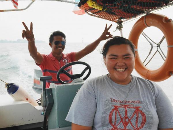 Our incredibly friendly boat captain on our way to the islands
