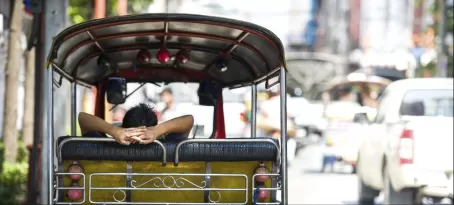 Tuk tuk driver taking a break