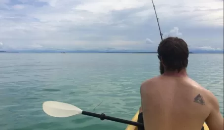 Matt fishing in the sea kayak