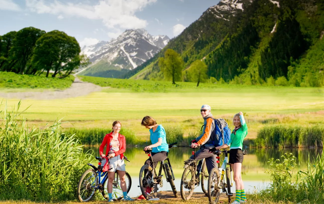 Friends biking during their trip together