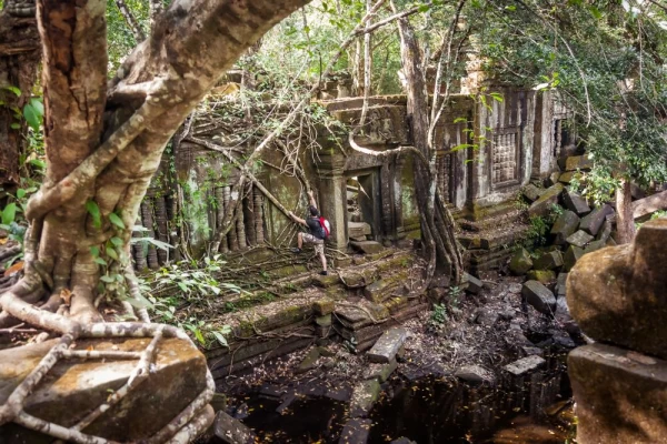 Hiking in jungle ruins in Cambodia