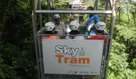 Headed up on the tram getting ready to zipline