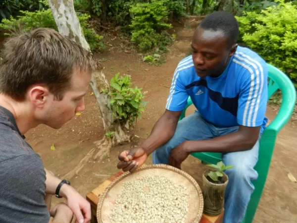 Jos shows us dried coffee beans after they have sat in the sun