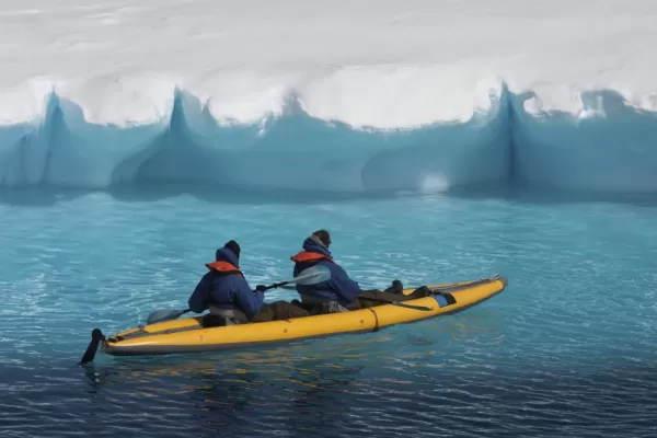 Kayaking by a glacier