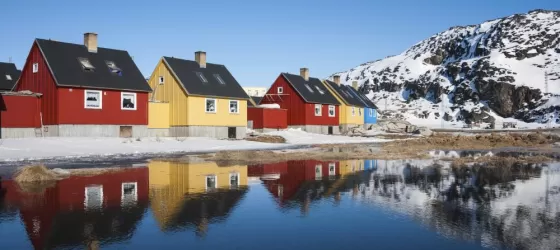 Reflection of colorful houses in Greenland